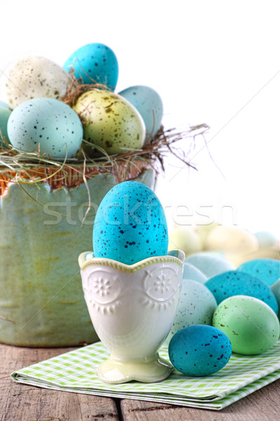 Easter scene with turquoise speckled egg in cup Stock photo © Sandralise