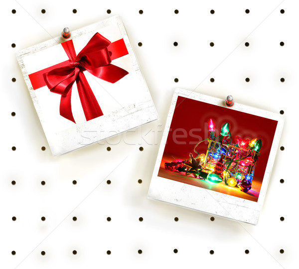 Stock photo: White peg board with photo frames