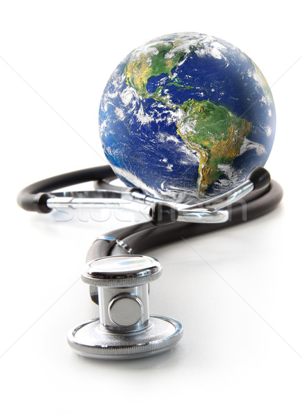 Stethoscope with globe on a white Stock photo © Sandralise