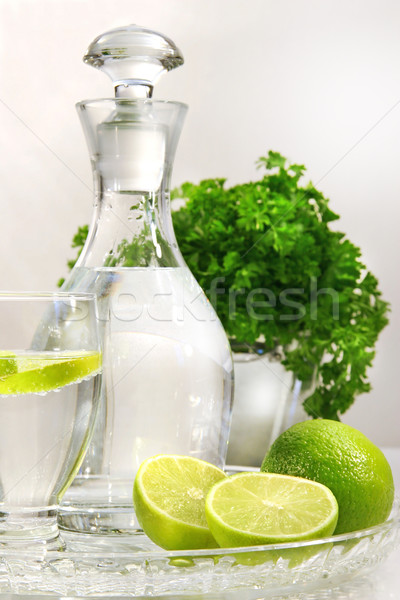 Fraîches eau verre contenant fruits vert [[stock_photo]] © Sandralise