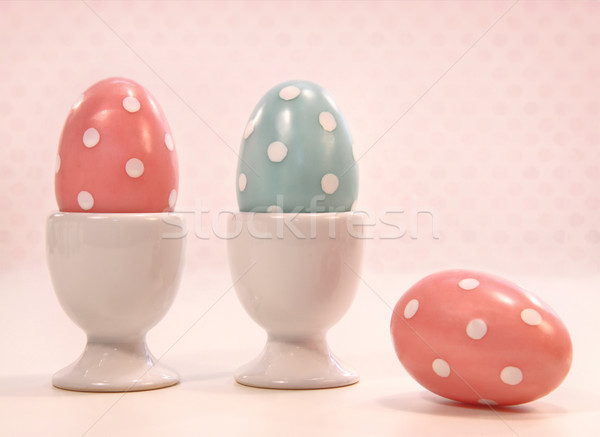 Colorful eggs in white cups Stock photo © Sandralise