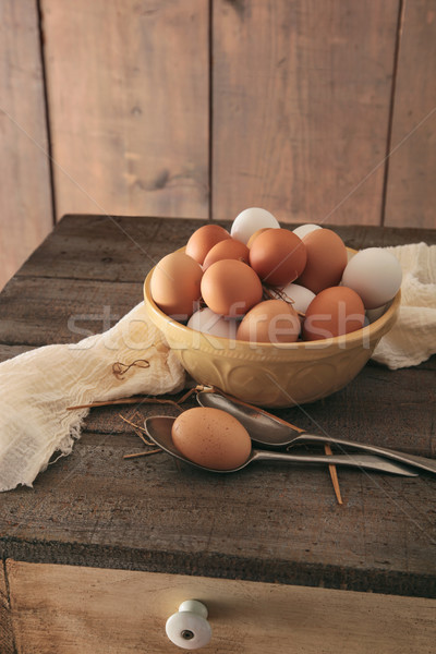 Fresh eggs on rustic wooden table Stock photo © Sandralise