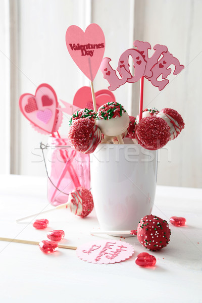 Cake pops with decorations on kitchen table Stock photo © Sandralise