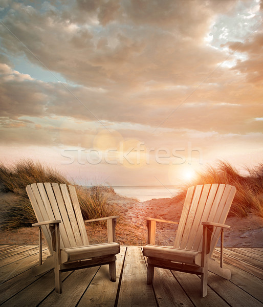 Fából készült fedélzet székek homok óceán természet Stock fotó © Sandralise