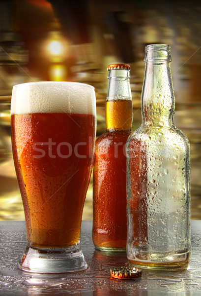 Vidrio cerveza botellas contra bar beber Foto stock © Sandralise