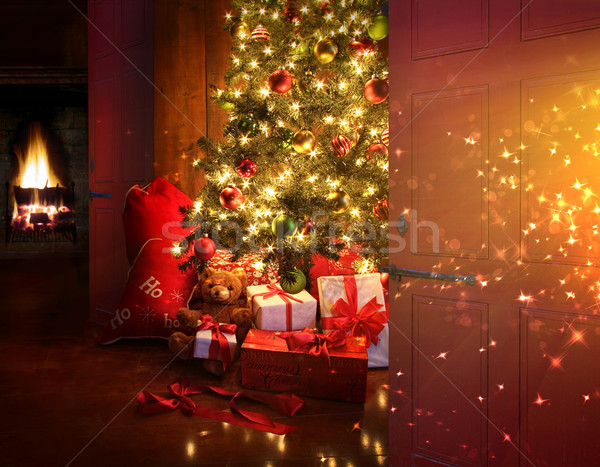 Christmas scene with tree and fire in background Stock photo © Sandralise