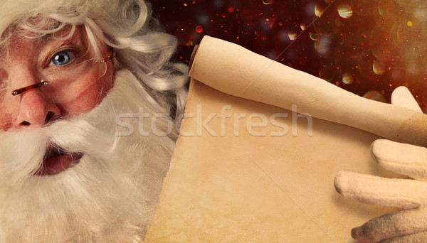 Closeup of Santa Claus holding a Santa List  Stock photo © Sandralise