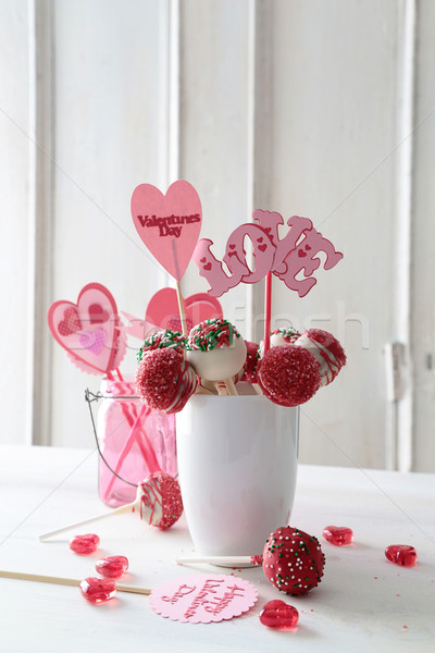 Cake pops with decorations on kitchen table Stock photo © Sandralise
