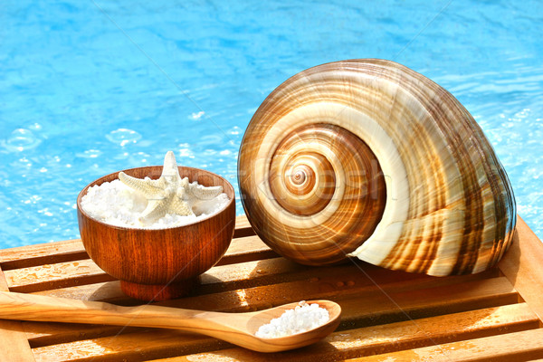 Bath salts and sea shell by the pool Stock photo © Sandralise