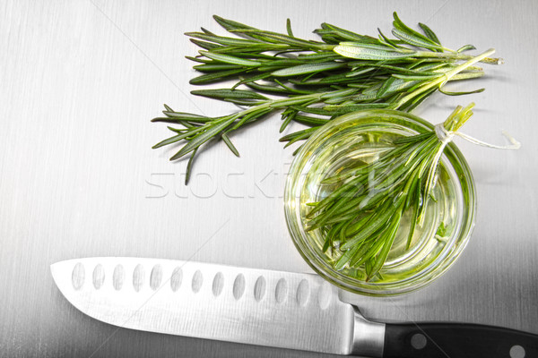 Rosemary leaves with cutting on stainless steel  Stock photo © Sandralise