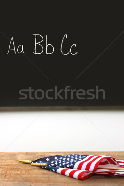 American flags laying on school desk Stock photo © Sandralise