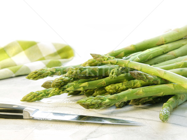 Freshly picked asparagus on white marble Stock photo © Sandralise