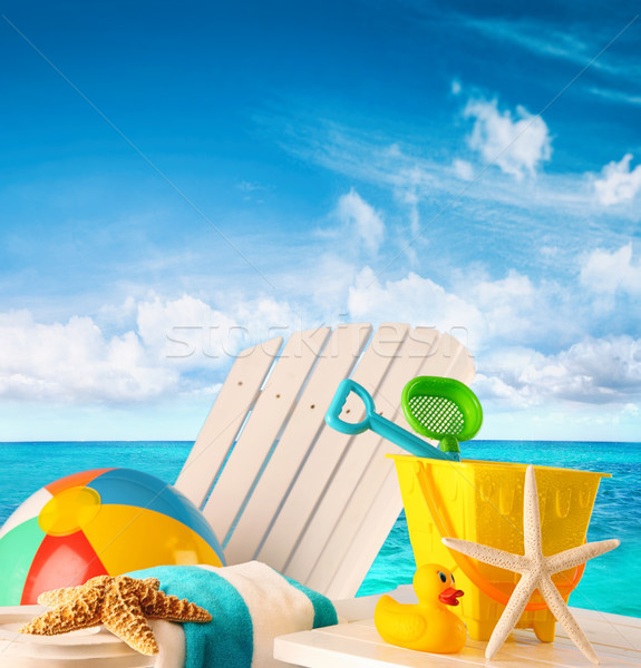 Beach toys on summer chair by the ocean Stock photo © Sandralise