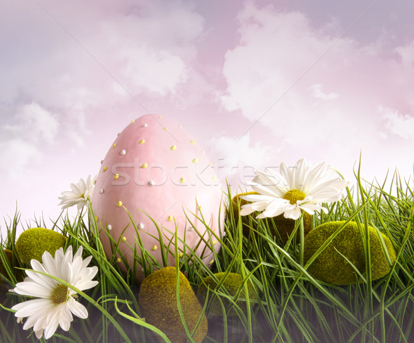 Large pink easter with flowers in tall grass Stock photo © Sandralise