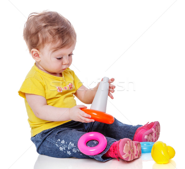 Stock photo: Girl playing pyramide