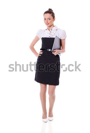 Permanent femme d'affaires une belle isolé blanche [[stock_photo]] © sapegina