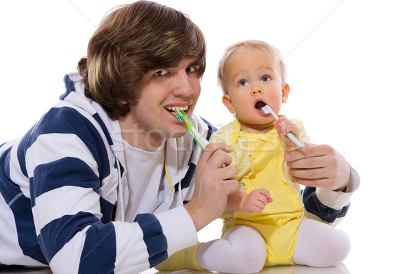 Fogmosás apa tanít baba izolált fehér Stock fotó © sapegina