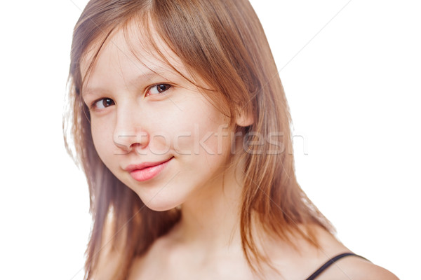 Odizolowany zamyślony teen girl uśmiechnięty patrząc Zdjęcia stock © sapegina