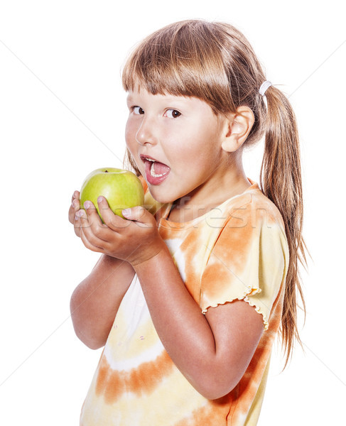 Stock photo: Girl holding apple