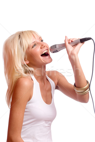 Zingen jonge mooie blond meisje geïsoleerd Stockfoto © sapegina