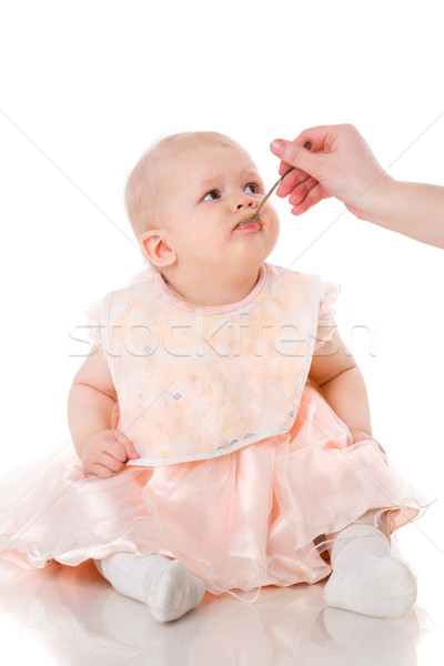 Bebé comer cuchara madres mano aislado Foto stock © sapegina