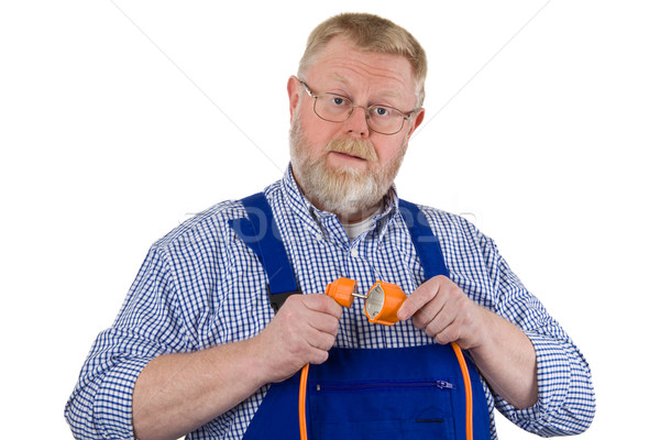 Electrician with extension cable Stock photo © Saphira