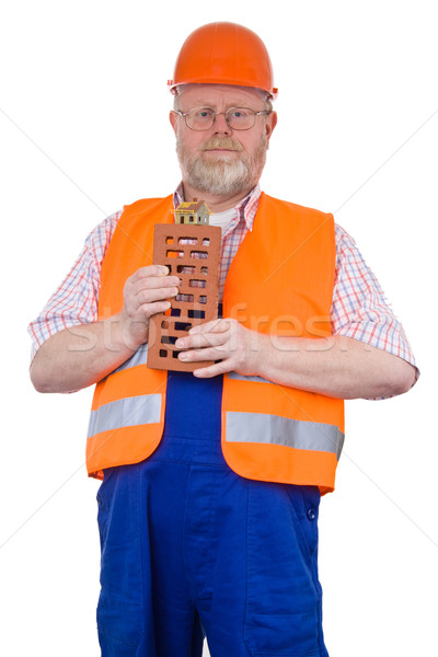 Construction worker with model house Stock photo © Saphira