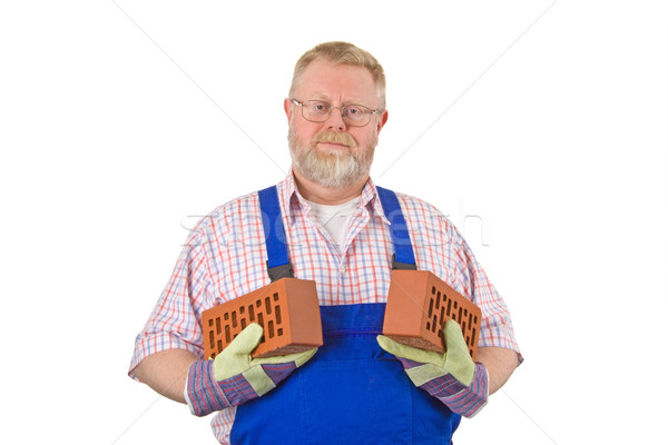 Bricklayer with two bricks Stock photo © Saphira