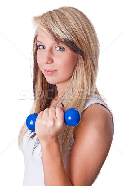 Erőedzés fiatal nő súlyzó izolált fehér lány Stock fotó © Saphira