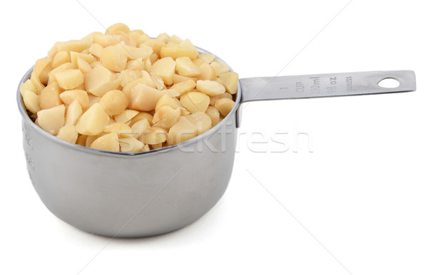 Foto stock: Picado · nueces · taza · medida · americano · aislado