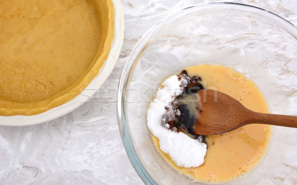 Stirring sugar into beaten egg for pumpkin pie filling Stock photo © sarahdoow