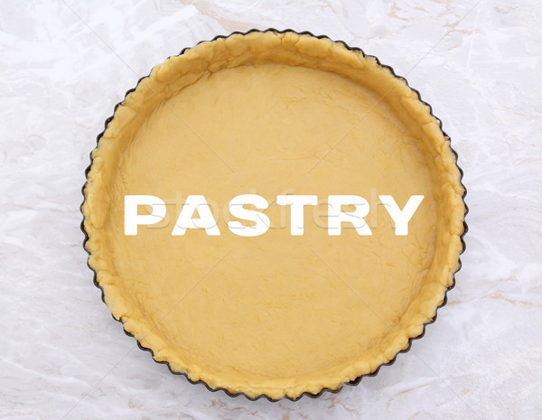 Stock photo: Flan tin lined with shortcrust pastry - PASTRY text