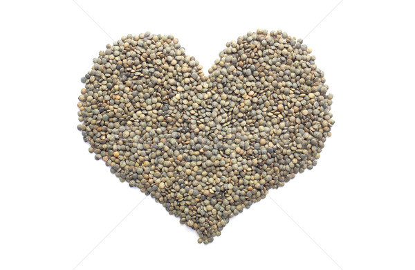 Marbled dark green lentils in a heart shape Stock photo © sarahdoow