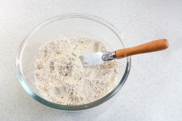 Mixing bread flour mix and butter with a knife Stock photo © sarahdoow