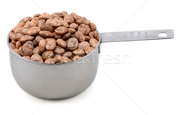 Pinto beans in an American cup measure Stock photo © sarahdoow