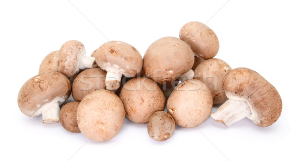 Heap of chestnut mushrooms showing caps and stalks Stock photo © sarahdoow