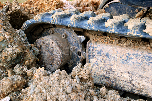 Closeup of digger's tracks in mud Stock photo © sarahdoow