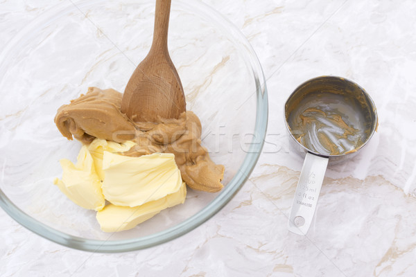 Manteca de cacahuete mantequilla cuchara de madera junto sucia Foto stock © sarahdoow
