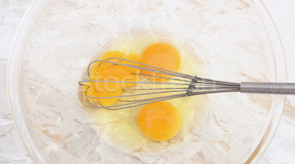 [[stock_photo]]: Trois · oeufs · fil · ballon · fouet · une