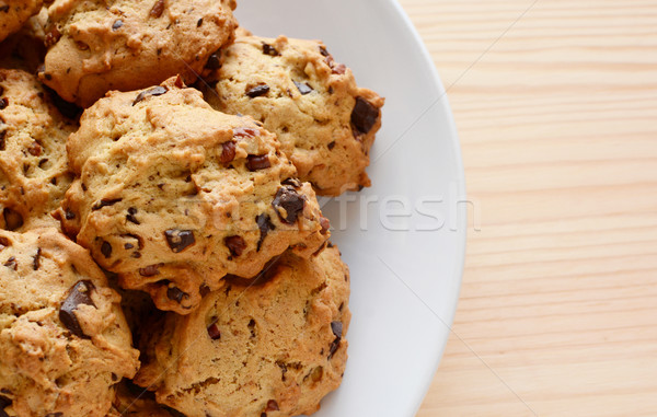 Closeup of fresh chocolate chip and pecan cookies Stock photo © sarahdoow
