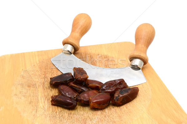 Whole dates with a rocking knife  Stock photo © sarahdoow