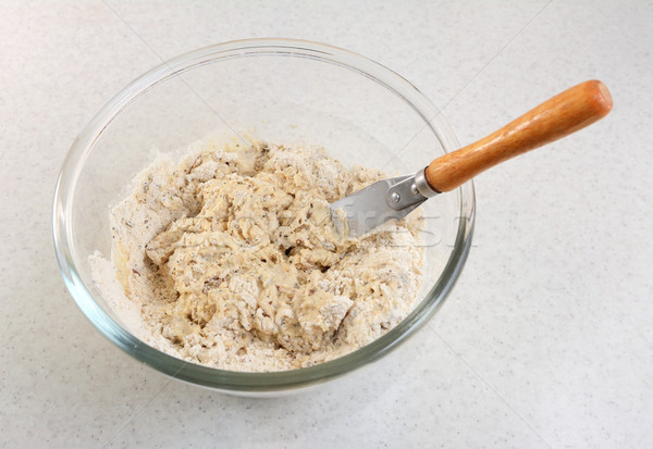 Mixing malted bread mix with a palette knife  Stock photo © sarahdoow