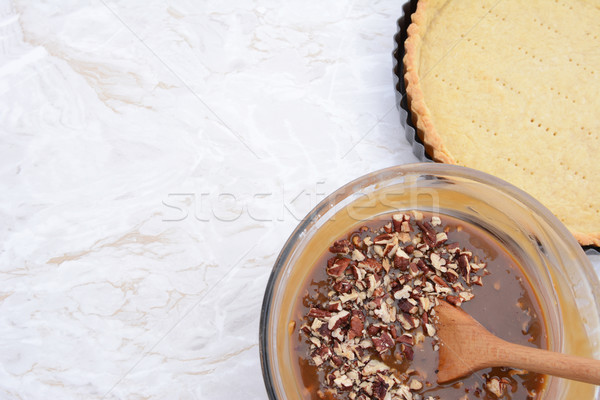 Baking pecan pie - pie filling and pastry crust Stock photo © sarahdoow