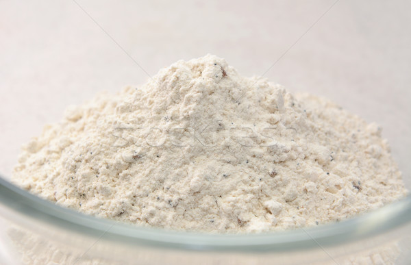 Close-up of bread flour mix in a glass bowl Stock photo © sarahdoow