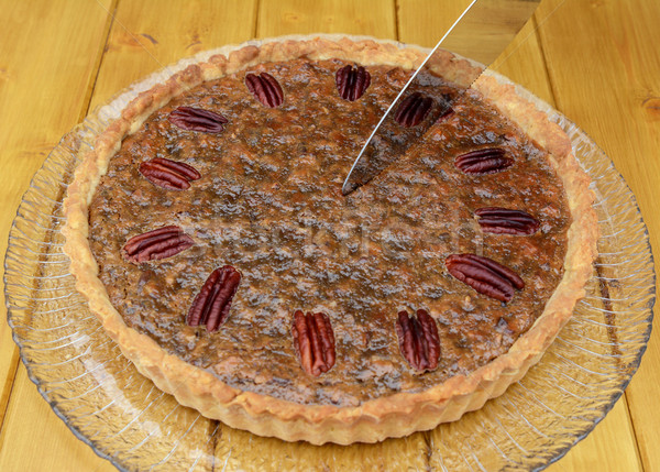 Starting to slice a pecan pie Stock photo © sarahdoow