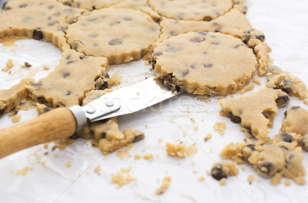 Palette knife lifting cookies from kitchen worktop Stock photo © sarahdoow