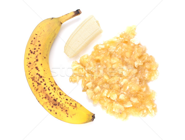 Spotty, overripe banana with whole and mashed fruit Stock photo © sarahdoow
