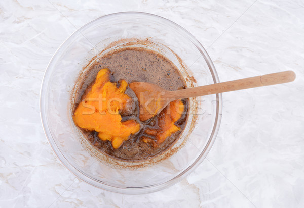 Stirring pureed pumpkin into pie filling Stock photo © sarahdoow