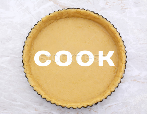 Stock photo: Flan tin lined with shortcrust pastry - COOK text