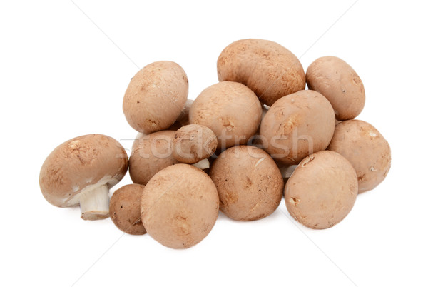Uneven pile of fresh chestnut mushrooms with brown caps Stock photo © sarahdoow